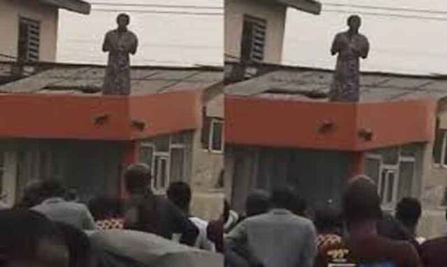 Mysterious woman lands on top of a building in Ejigbo area of Lagos state (video)