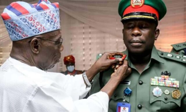 Fmr. Pres. Obasanjo decorates his son with the rank of Brigadier General of the Nigerian Army