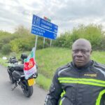 Nigerian tourist is biking from London to Lagos to raise money for charity.