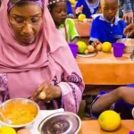 Schoolchildren jubilate as FG adds N30 to their daily feeding