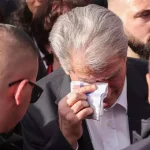 Former Albanian president Sali Berisha punched in the face and left with a black eye after thug attacked him during anti-govt protest