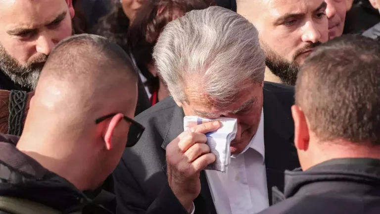 Former Albanian president Sali Berisha punched in the face and left with a black eye after thug attacked him during anti-govt protest