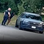 U.S. police officer suspended over viral video of him ki§§ing a woman and climbing into squad car with her