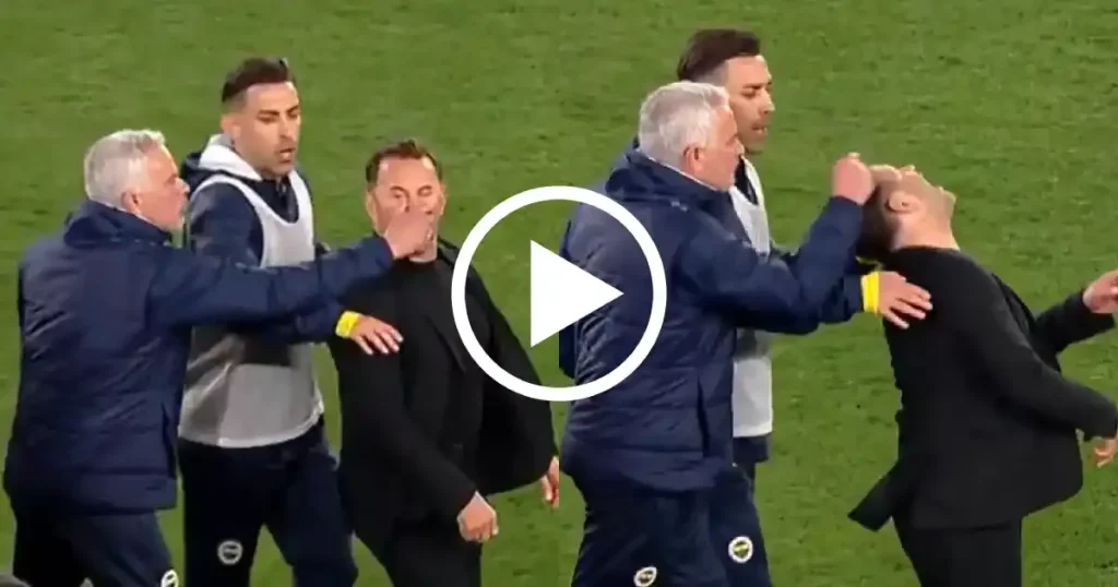 Jose Mourinho pinches the nose of Galatasaray coach Okan Buruk as he loses Istanbul derby with Fenerbahce