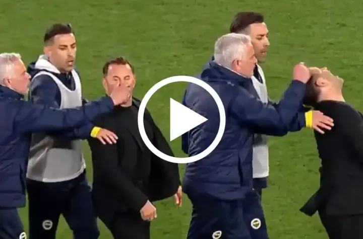 Jose Mourinho pinches the nose of Galatasaray coach Okan Buruk as he loses Istanbul derby with Fenerbahce