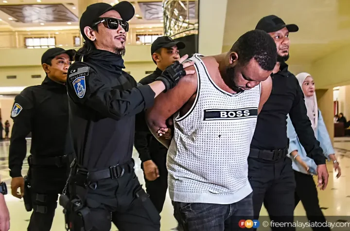 Nigerian Man Denied Bail After Allegedly B+ting Off Malaysian Cop’s Ear During Arrest