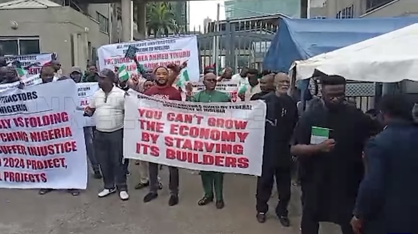 JUST IN: Protest Breaks Out in Abuja, Entrance to Finance Ministry Blocked [PHOTOS]