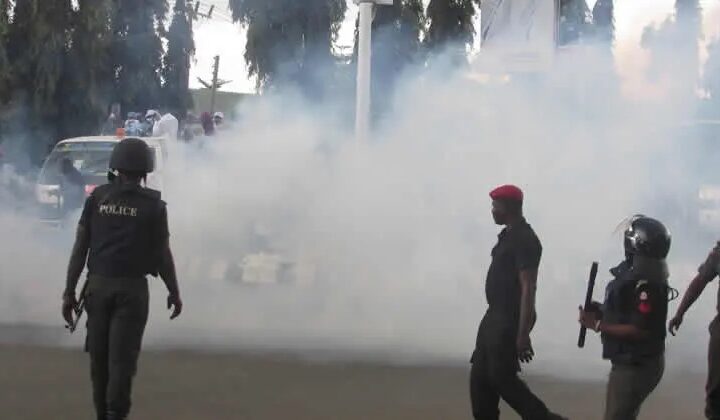 BREAKING: Tear gas fired as El-Rufai supporters, protesters clash at EFCC Headquarters